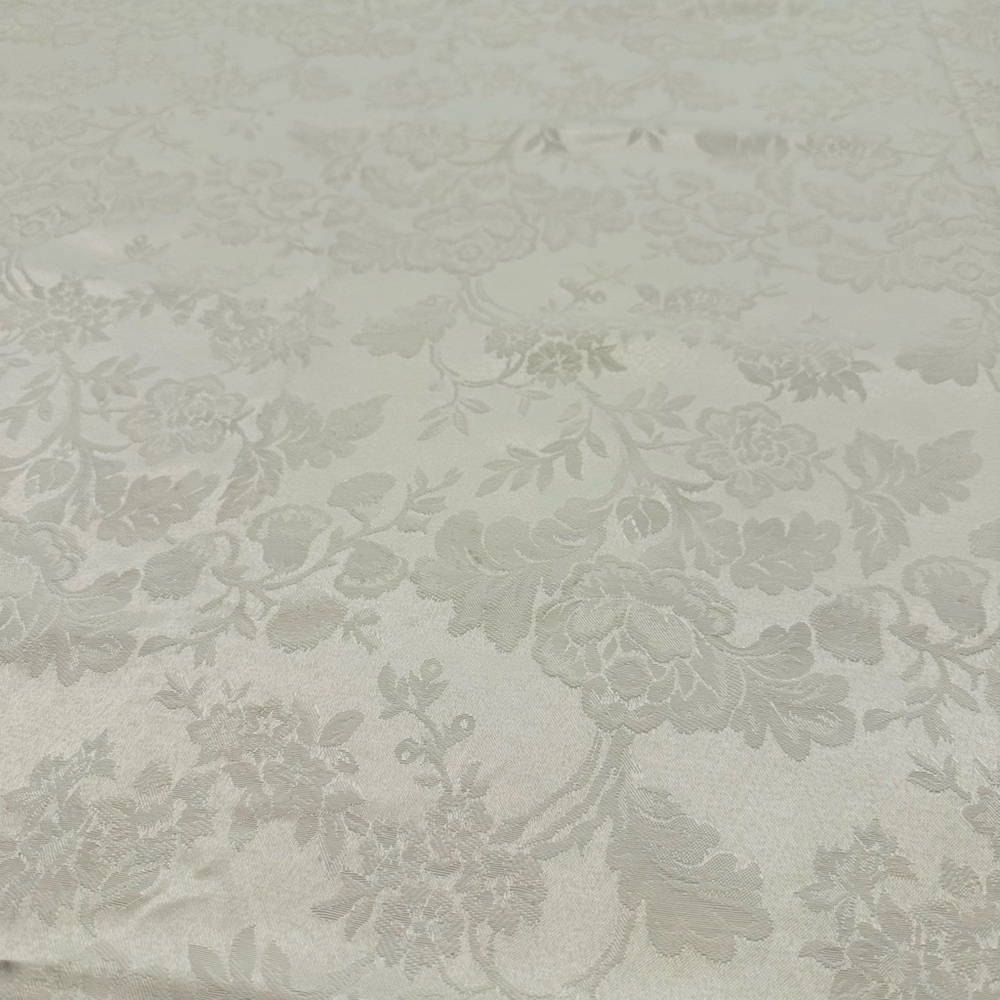 White floral table linen, oblong approximately 98” x 56”